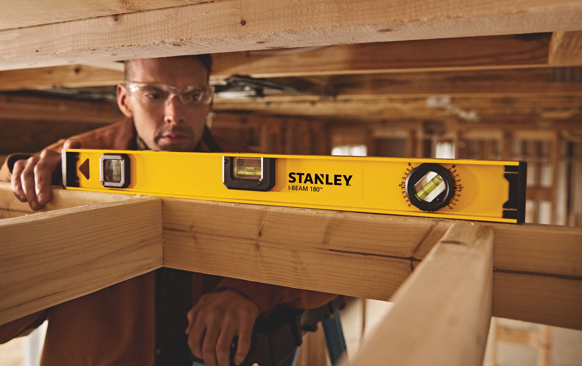 24 inch I beam 180 level being used to level.