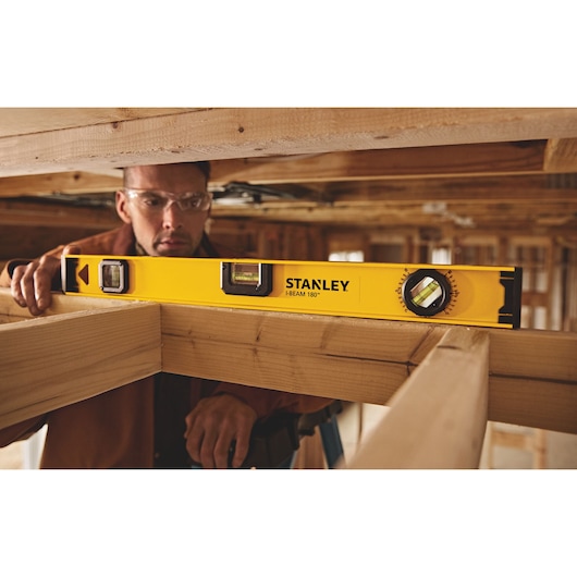 24 inch I beam 180 level being used to level.
