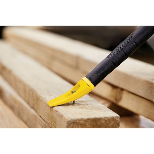 15 inch fat max fubar utility bar being used for removing nail.