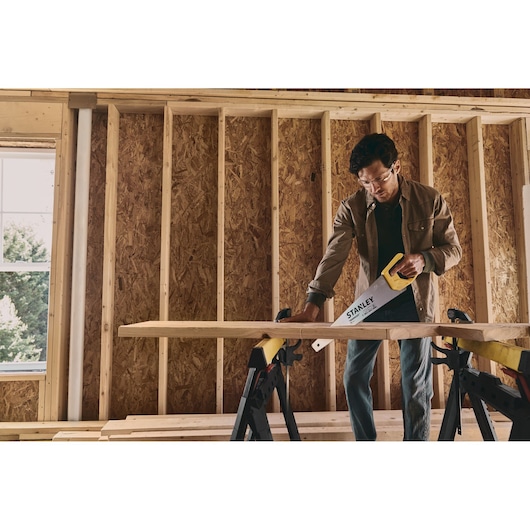 20 inch TRADE CUT Panel Saw being used for cutting wood.
