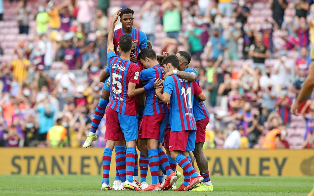 Barcelona Futbol Club celebrating in the field