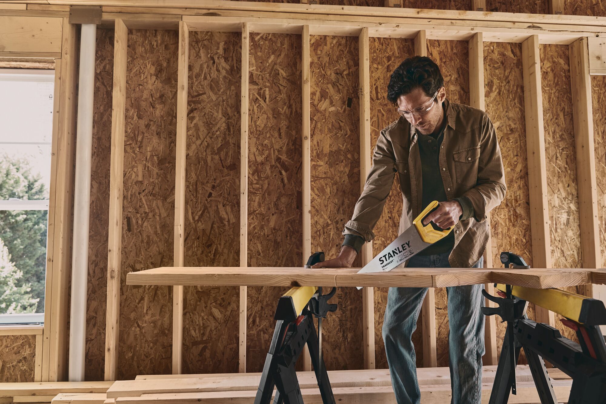 15 inch TRADE CUT Panel Saw being used for cutting wood.